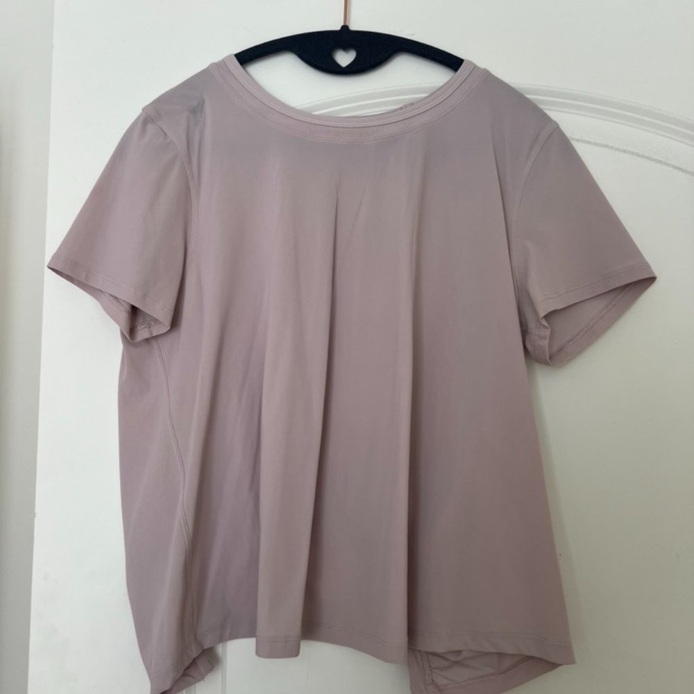 Lavender lululemon short sleeve with cut out on back size 6